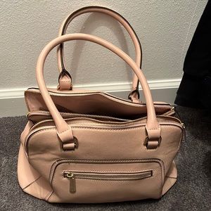 Cream colored purse. Lightly used